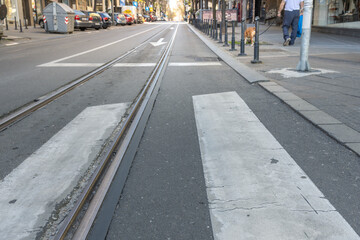 Street with a white line down the middle and a white line on the right side