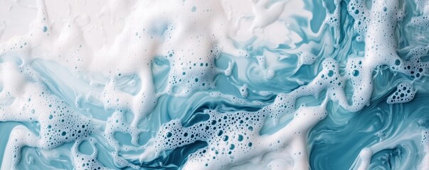 Naklejka premium Abstract blue and white foam waves, artistic texture. Ocean inspiration and fluid art concept