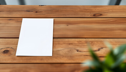 Fototapeta premium blank paper A4 flyer for mockup template design logo branding on wooden background isolated with white highlights, png