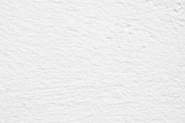 White concrete wall texture background. Uneven render stucco white painted concrete wall texture background. Rough and grunge wall in the sun.	