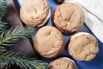 Homemade gingerbread whoopie pies with cream cheese icing.  Best dessert or baked goods for holiday parties or when your feeling cozy.