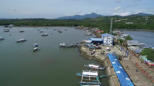 Puerto Princesa in Palawan, Philippines.  Honda Bay with Coastline and Boats in Background. Sulu Sea. Drone