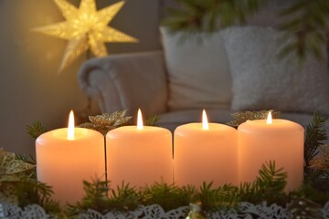 Four Advent candles are burning