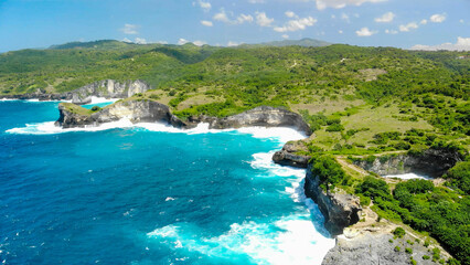 Big sea waves crashing on rocks