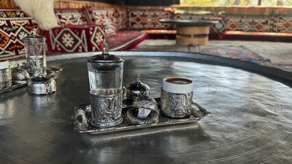 Turkish coffee in the authentic cup in the historical display