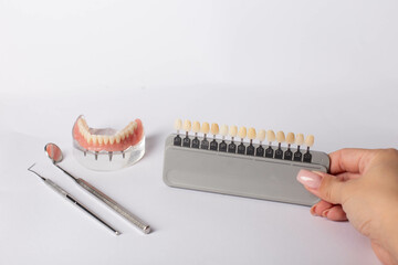 render of mandibular prosthesis all on 4 system supported by implants over white background
