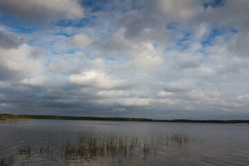 Retro boat in a misty lake. Fog in Shatsky lake, Ukraine. High resolution photo.