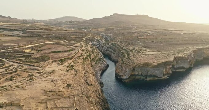 Aerial view salt plants Zebbug Island of Gozo Malta. Abandoned mines on the shores of the Mediterranean Sea. High quality 4k footage