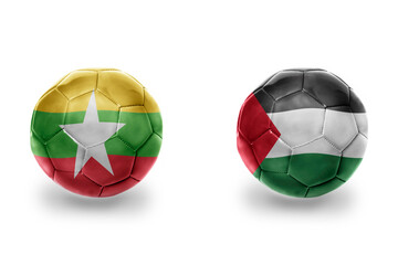 football balls with national flags of palestine and myanmar ,soccer teams. on the white background.