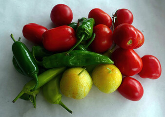 Fresh garden vegetables on white background