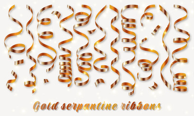 Golden curly streamers. Gold shiny serpantine ribbons. Confetti. New year decoration on light background.