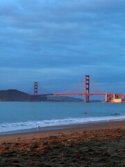 Golden Gate Bridge at Sunset from a Sandy Beach