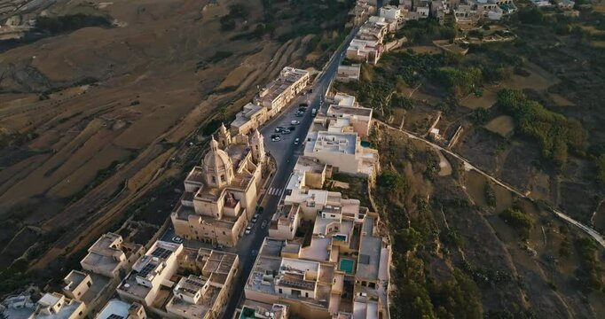 Aerial View of Zebbug Parish Church and Historic Cityscape on Gozo Island Malta Featuring Beautiful Mediterranean Architecture. High quality 4k footage