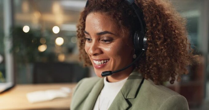 African woman, call center and talk at office, happy and advice with telemarketing at night. Person, consultant and headset with mic, smile and customer service on voip for tech support at startup