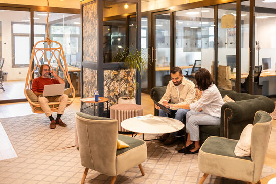 People collaborating in a modern creative coworking space