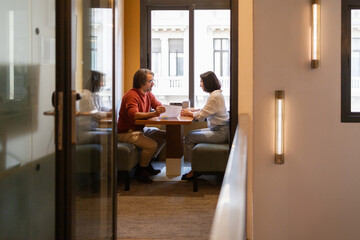 Collaboration in a modern coworking office setting