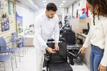 Orthopedic Supply Store, Staff Assisting Customer with Equipment