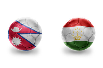 Fototapeta premium football balls with national flags of tajikistan and nepal ,soccer teams. on the white background.