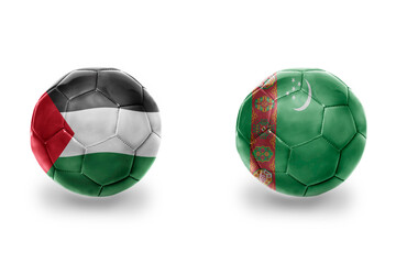 football balls with national flags of turkmenistan and palestine ,soccer teams. on the white...
