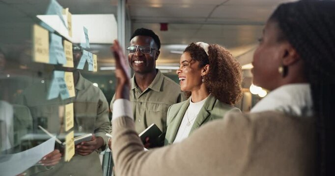 Business, people and documents with sticky notes on glass wall with training, workflow management and coaching. Professional, team and laughing in office for company workshop and upskill development