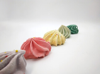 colorful meringue cookies angled view
