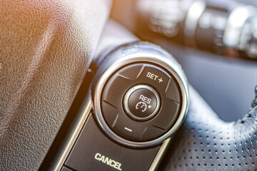 Inside the car.Multimedia leather steering wheel in a modern expensive car.Dashboard, inner workings of a car.