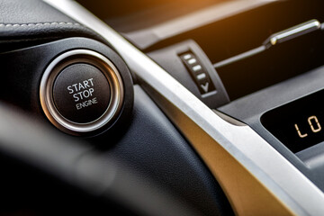 Inside the car.Car engine start stop button of a modern car.Vehicle interior.Dashboard, inner...
