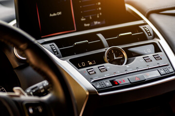 Naklejka premium Dashboard, inner workings of a car.Modern car interior details. Car detailing.