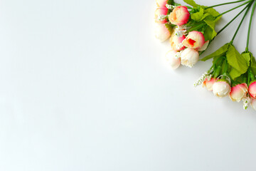 Bunch of pastel color rose buds in right top corner. Horizontal background image with copy space for valentine's day, mother's day, wedding invitation card or romantic date.