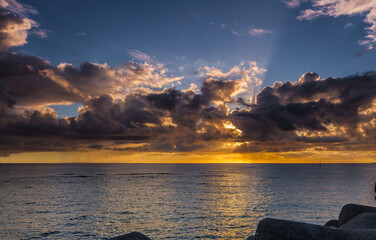 Colorful cloudy sundown scene in Sunset Beach, Chatan Okinawa, Japan