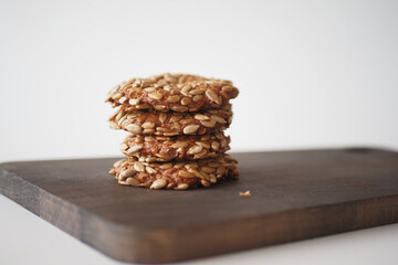 Indulgent and Delicious Healthy Oatmeal Cookies Beautifully Stacked on a Rustic Wooden Board
