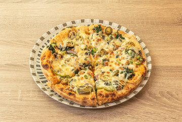 Pizza versatility in terms of ingredients and styles makes it a blank canvas for culinary creativity