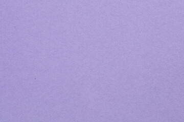 A purple background with a white line, textured origami paper backdrop