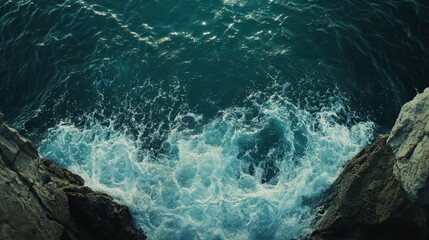 Fototapeta premium Aerial View of Deep Turquoise Waves Crashing Against Rocky Shoreline. Generative AI