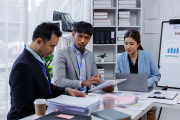 Asian business people working together in the office, Young asian people at business meeting.
