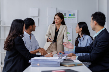 Asian business people working together in the office, Young asian people at business meeting.
