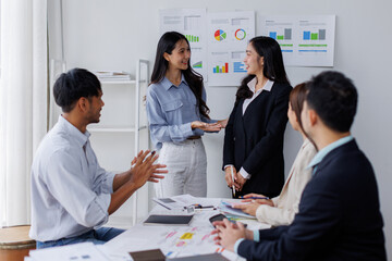 Asian business people working together in the office, Young asian people at business meeting.
