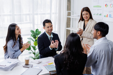 Asian business people working together in the office, Young asian people at business meeting.
