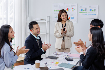 Asian business people working together in the office, Young asian people at business meeting.
