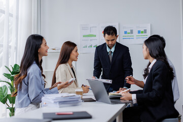 Asian business people working together in the office, Young asian people at business meeting.
