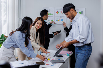 Asian business people working together in the office, Young asian people at business meeting.
