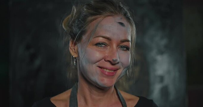 Woman Artist Smiling With Face Mask