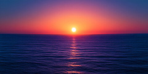 Obraz premium A Vivid Sunset Over a Calm Ocean with a Crimson and Blue Sky
