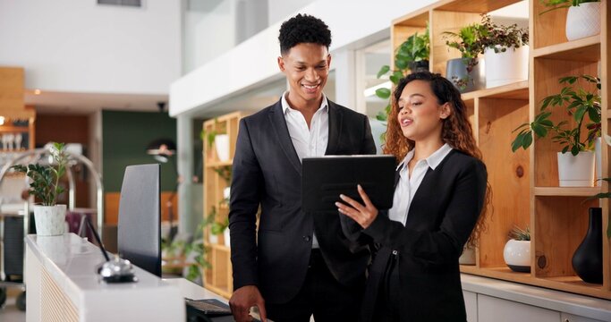 Reception, employees and tablet with teamwork, hotel and smile with accommodation. Coworkers, hospitality and friendly service with technology, internet and digital app for schedule, mentor and lodge