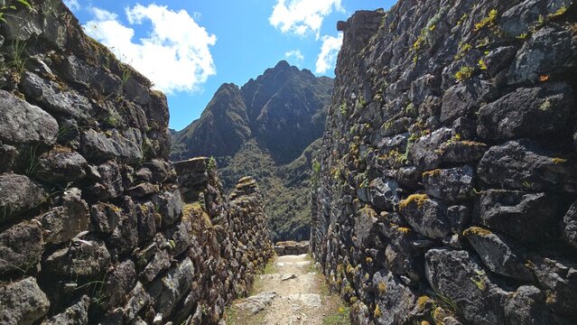 Street between buildings at Sayacmarca, lost Inca miliary fortress located along the Inca Trail to Machu Picchu. It was never discovered due to its hidden location in the Andes.