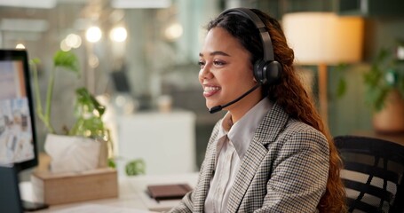 Woman, call center and happy at night, computer and headphones with customer support, job and microphone. Person, agent and consultant with voip, thinking and overtime with telemarketing at workplace