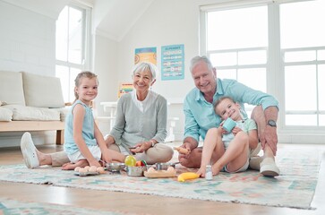 Fototapeta premium Grandparents, toys and children in home for bonding, development and play games with portrait. Senior people, puzzle and kids in lounge for happy family, education and learning on weekend with relax