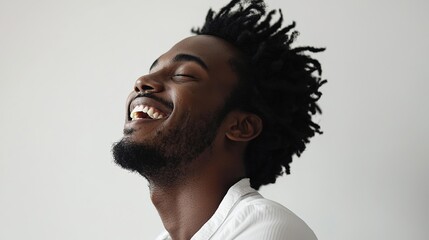 Obraz premium Joyful Young Man Smiling in Portrait Style