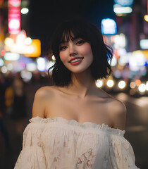 Naklejka premium Woman in dress on the street at night