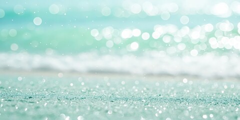 Abstract bokeh background with soft focus on a bright turquoise water surface and sparkling sandy beach
